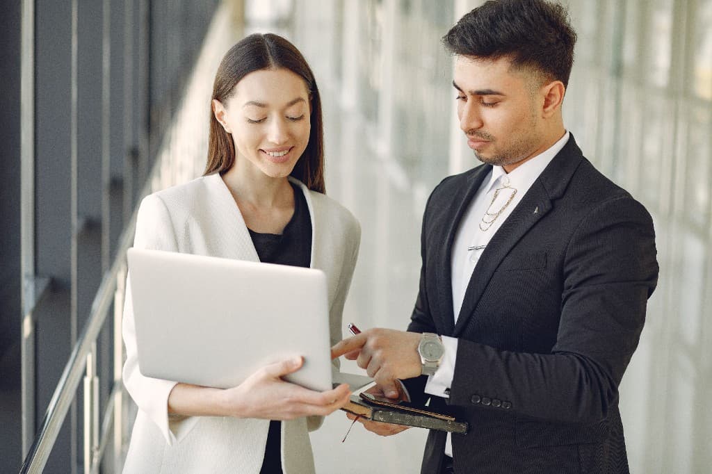 Professionals collaborating at work